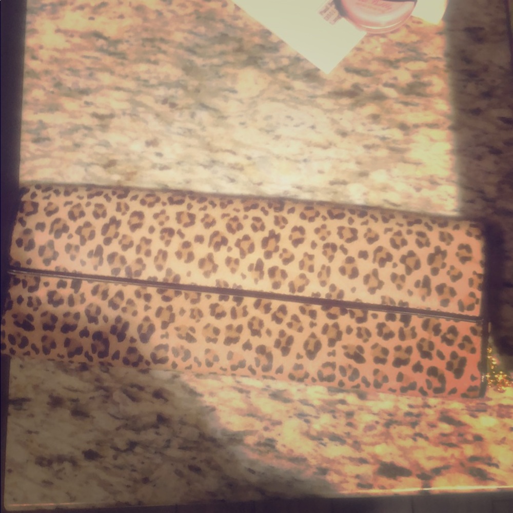 Aldo animal print clutch